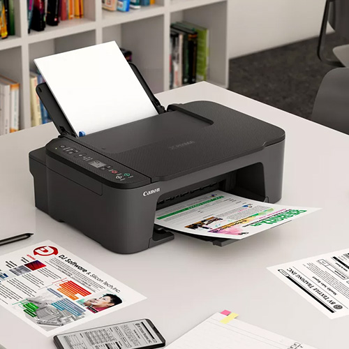 Canon-Pixma-TS3440-Inkjet-Printer-with-paper-on-table