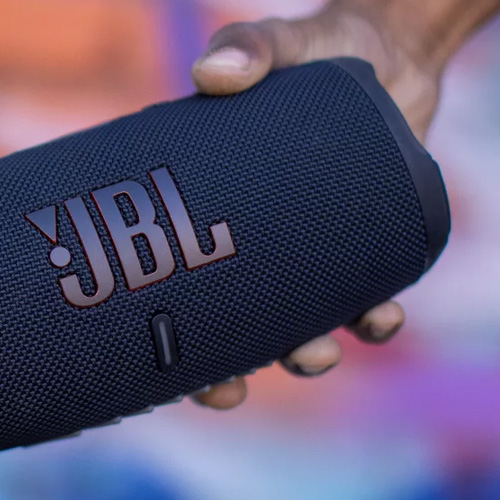 JBL-Charge-5-Portable-Waterproof-Speaker-being-hold-in-hand